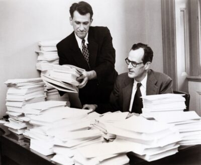 E. Cuyler Hammond and Daniel E. Horn collect data for a 1950's landmark study on the link between smoking and lung cancer.