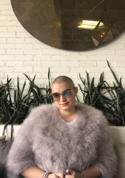 Sandino with her head shaved.